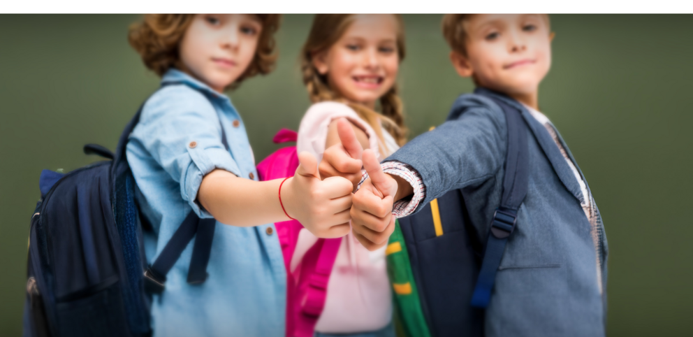 Lighting solutions for the next generation Group of children giving a thumbs up for the camera