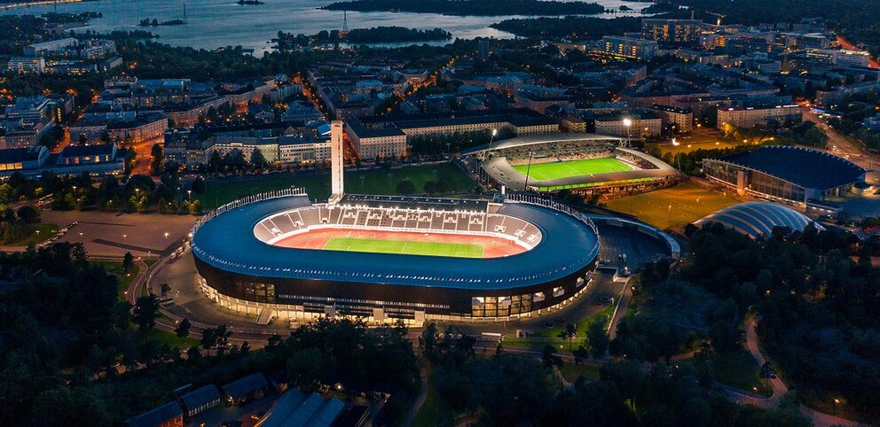 Olympic Stadium in Helsinki at night.