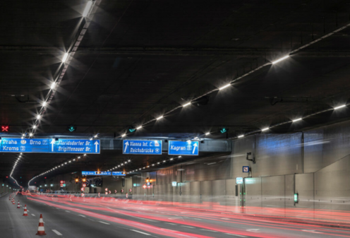 Tunnel Kaisermühlen tunnel in Vienna, at night, photographed from the inside.
