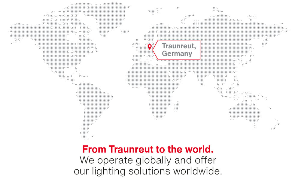 From Traunreut to the world. World map marking the Traunreut headquarters in Germany with the caption: From Traunreut to the world. We operate globally and offer our lighting solutions worldwide.